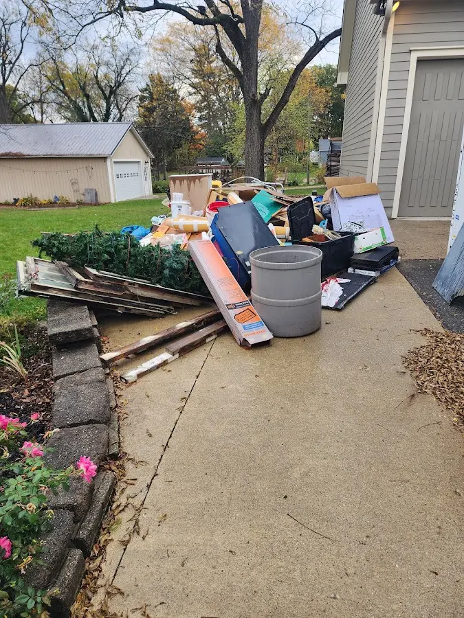 Dumpster being loaded with debris for 3 Yard Dumpster Rental in Antioch
